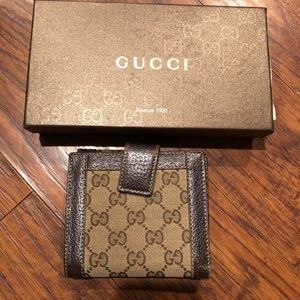 Authentic GUCCI monogram bifold leather wallet